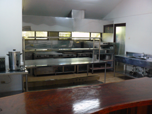 The kitchen is amazingly well outfitted, including a pizza over and a walk-in freezer..